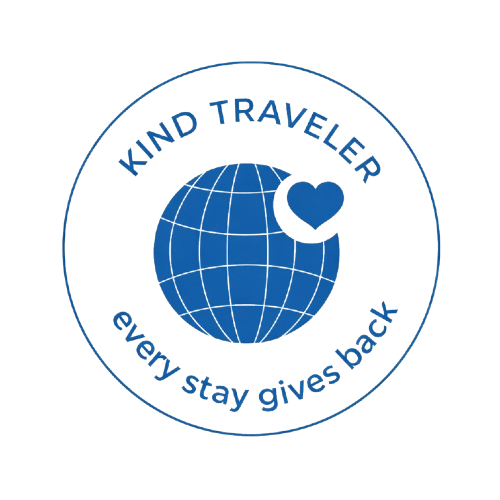 Blue globe with heart and text 'Kind Traveler, every stay gives back' in a circle.