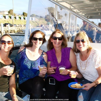 a group of people sitting posing for the camera