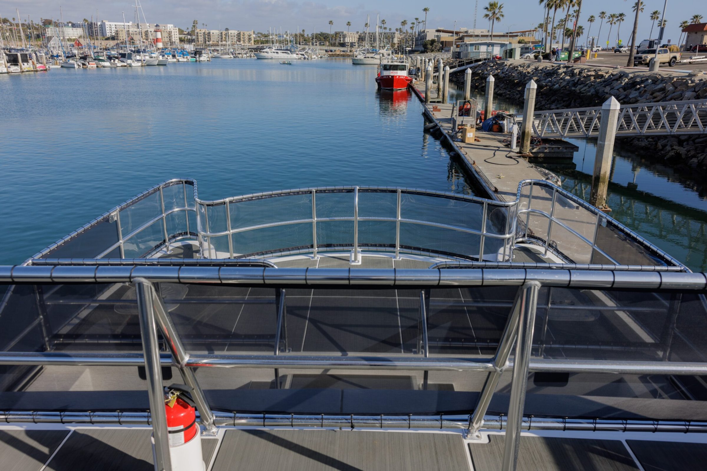 a boat is docked next to a body of water