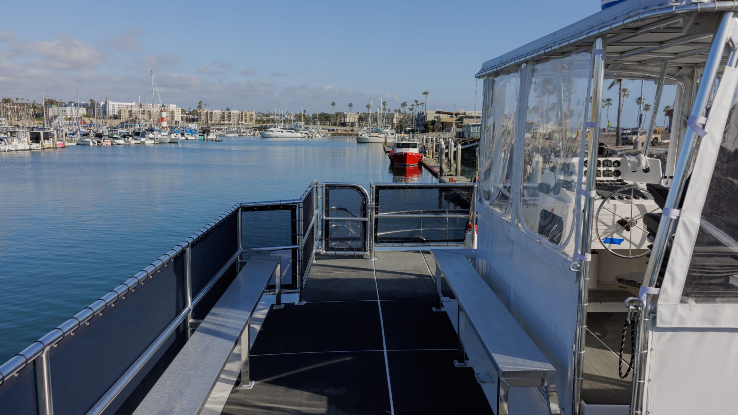 a boat is docked next to a body of water