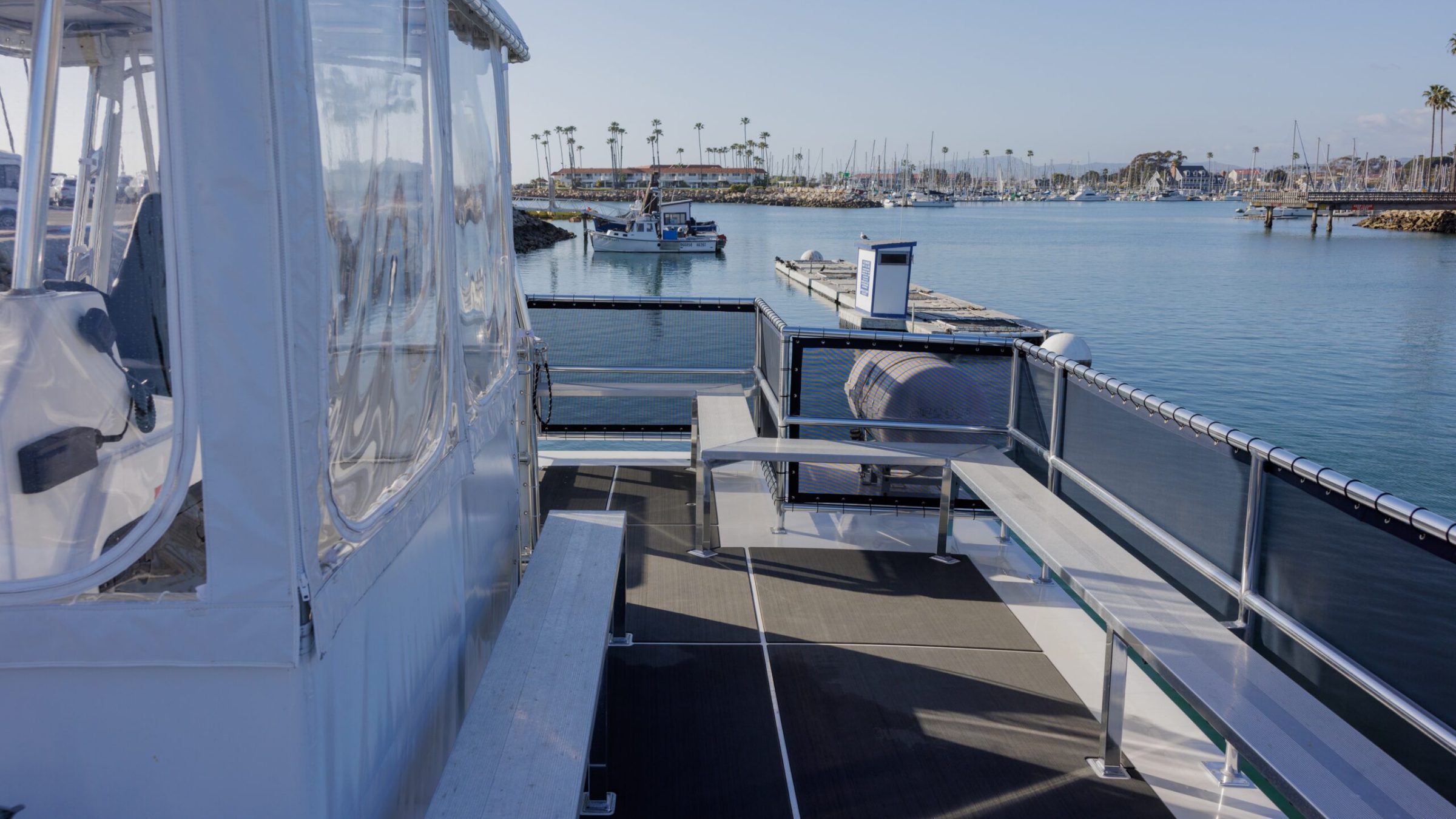 a boat is docked next to a body of water