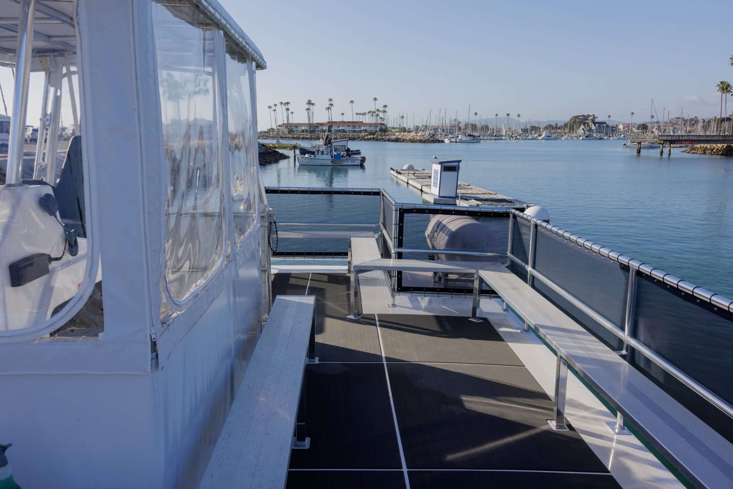 a boat is docked next to a body of water